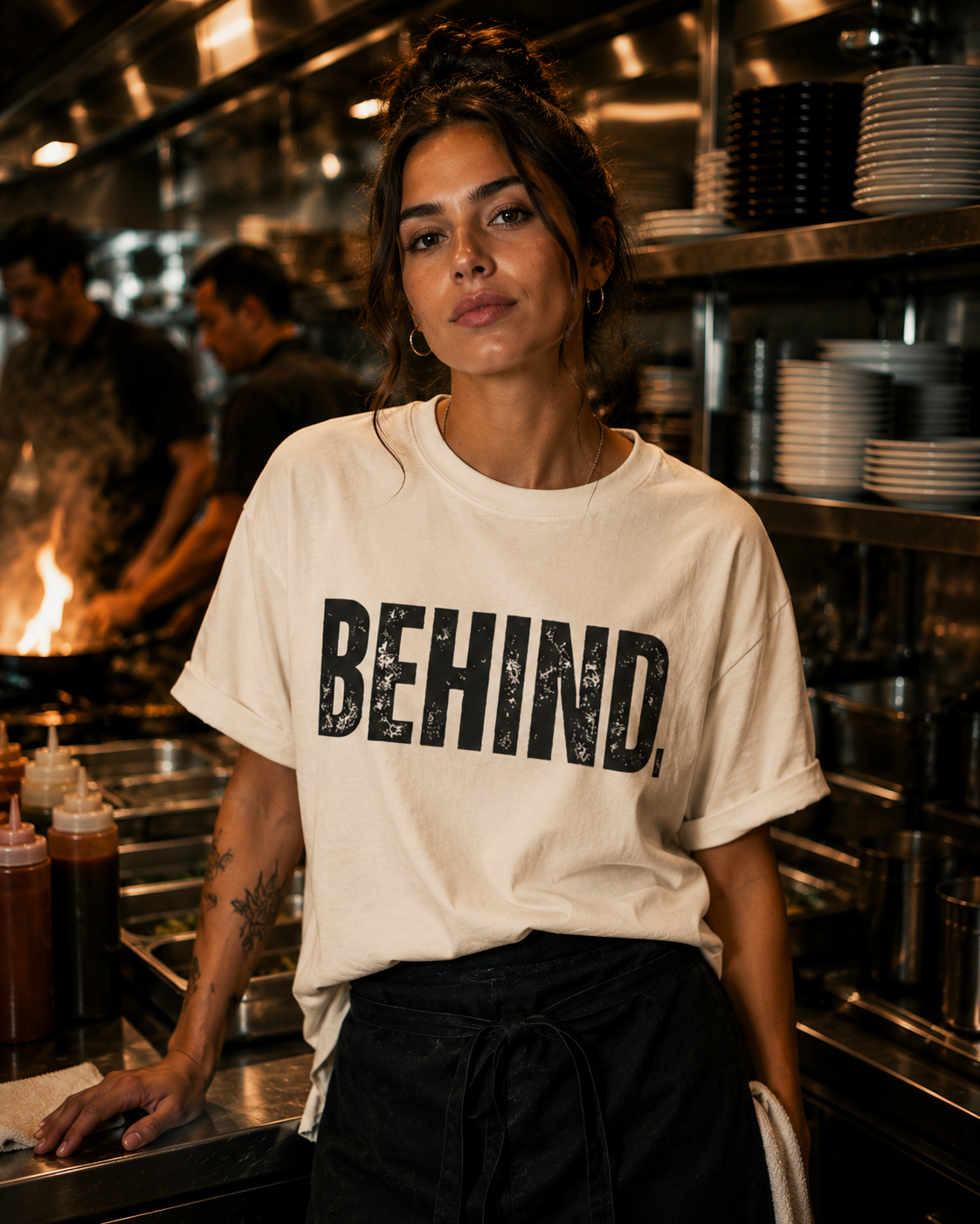 BEHIND. Tee